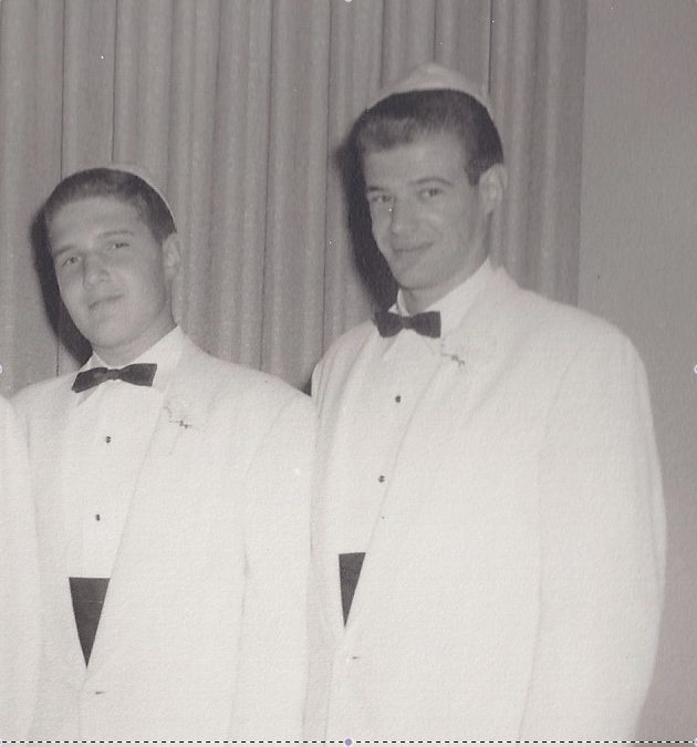 Older brother Sam and younger brother Dan in tuxedos at a family wedding, mid-to-late 1950s.