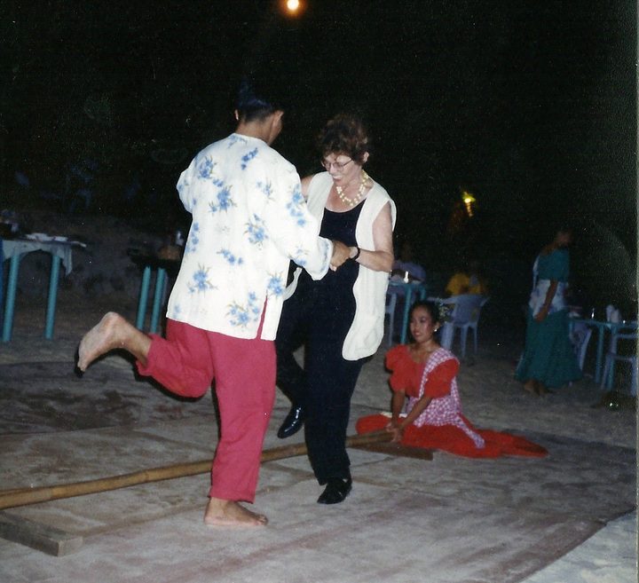 Myrna taking time off to dance at a celebration in the Philippines.