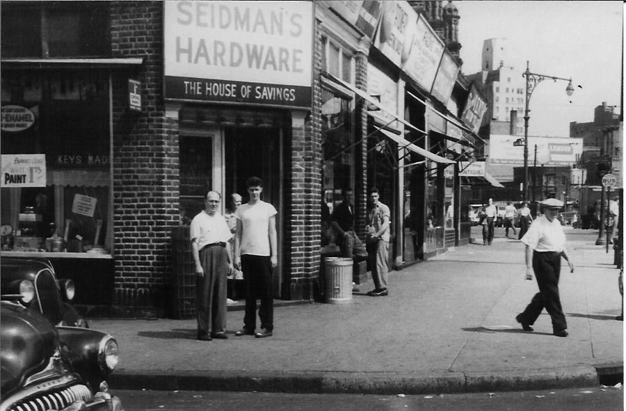 Myrna’s older brother Sam and their father outside the family hardware store in Brooklyn. This modest two-aisle store put three children through college on one income, a feat much harder today.