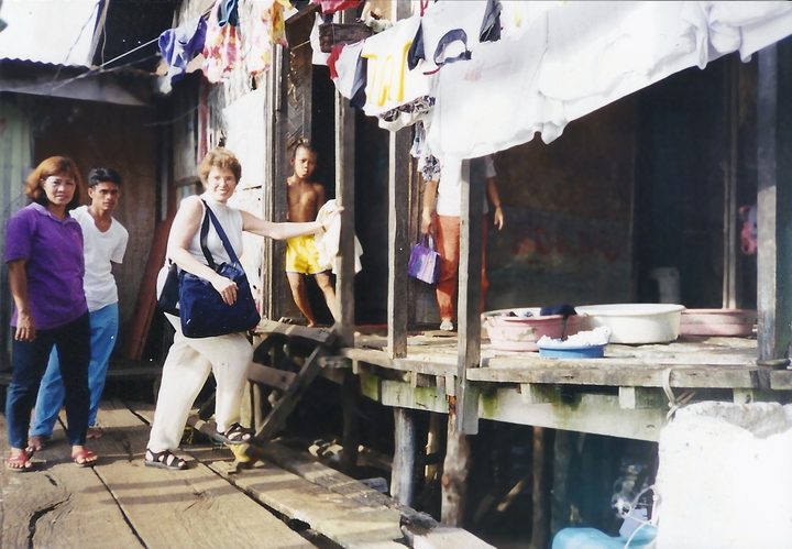 Myrna in the field, likely in the Philippines, where she worked after the Somali civil war ended her work in Somalia.